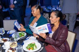 02.-2023-FRD-Attendees-looking-at-the-program-4211