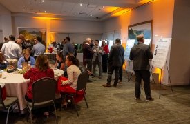 Attendees-looking-at-boards-2