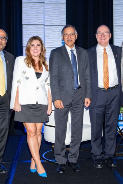 Pictured from left to right are Dean Sridhar Sundaram, Dr. Mira Farka, Dr. Anil Puri, president of Farmers & Merchants Bank, and title sponsor, Kevin Tiber, and OCBC President and CEO Jeff Ball.