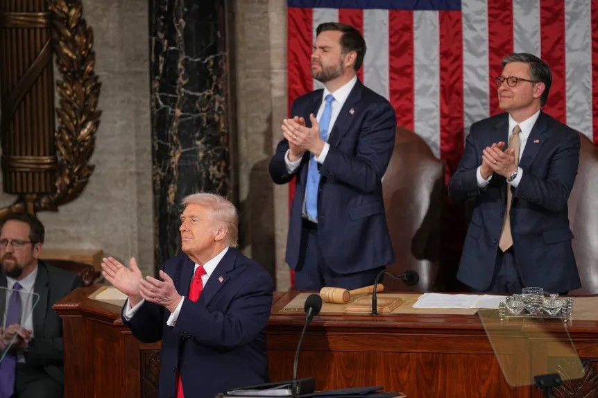 President Donald Trump and Vice President JD Vance applauding