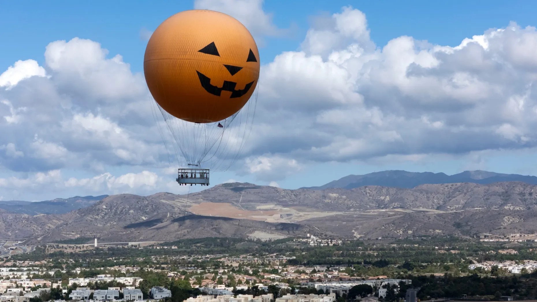 The Great Park balloon, done up as a jack-o’-lantern, rises in Irvine in October 2025. Irvine was voted best city to live in the Orange County Register’s Best of Orange County 2026 balloting. Photo by Paul Bersebach, Orange County Register-SCNG